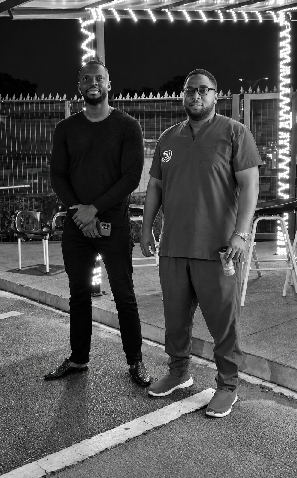 Two people standing at the Wash centre